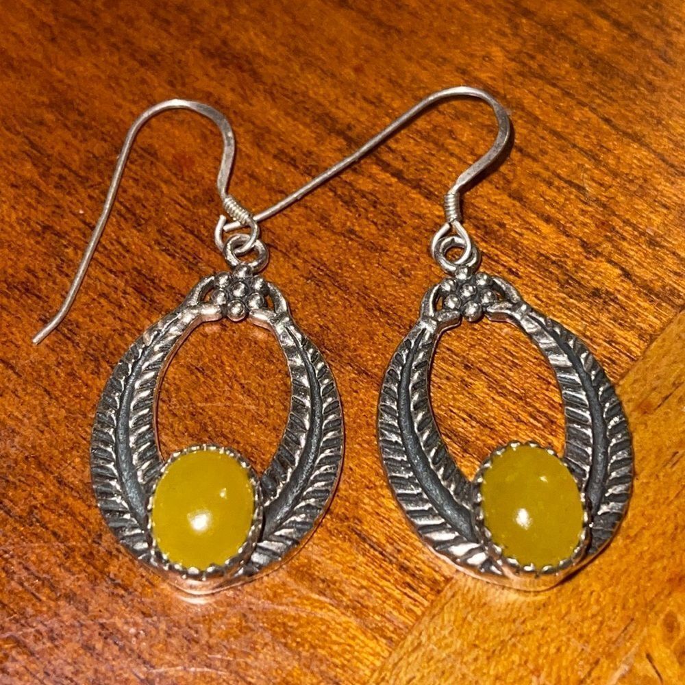 Costume jewelry silver tone dangle earrings